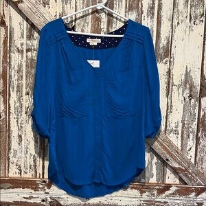 Chic Blue Blouse with Polka Dot Lining